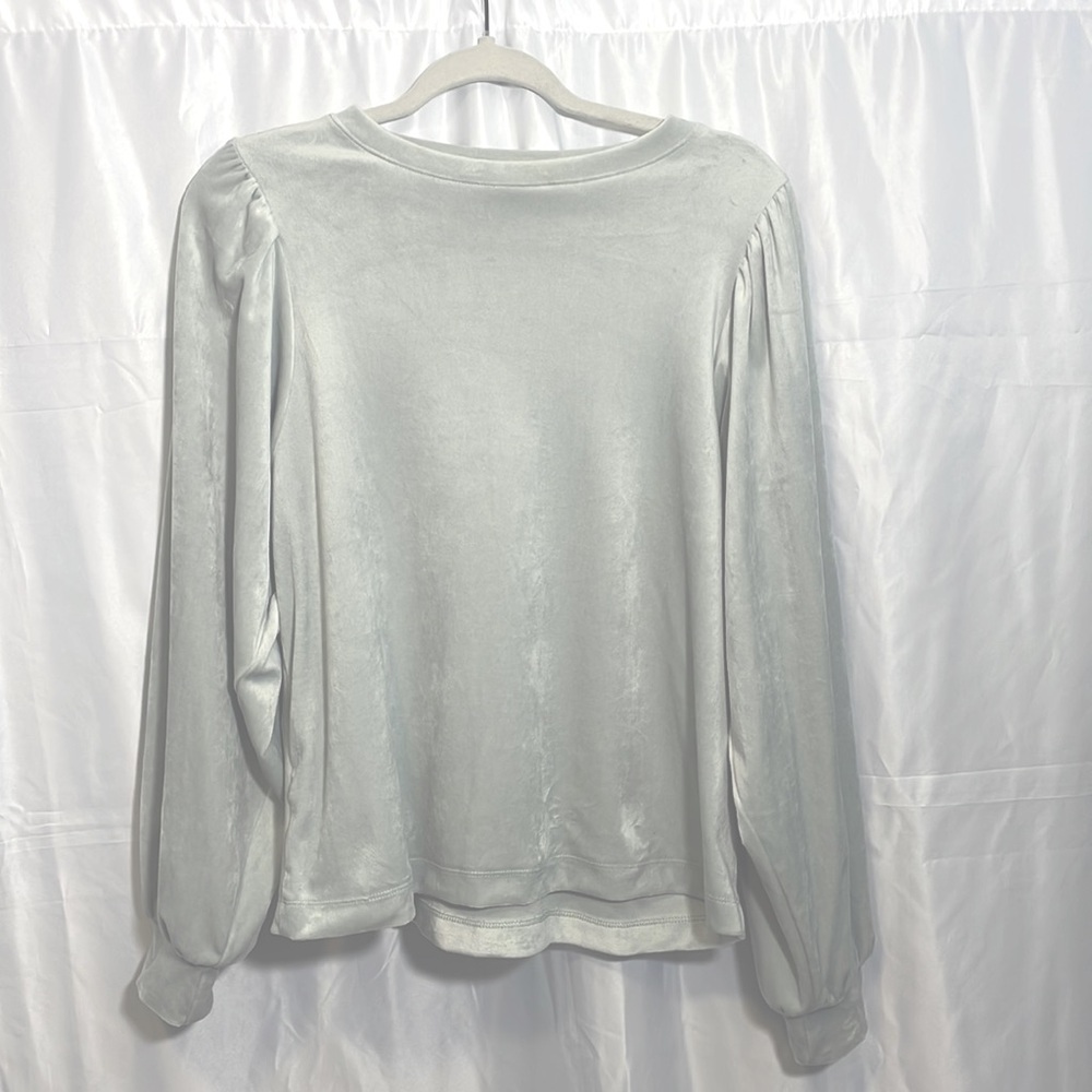 Sliver / light gray puffy cuffed sleeve velour sweatshirt.